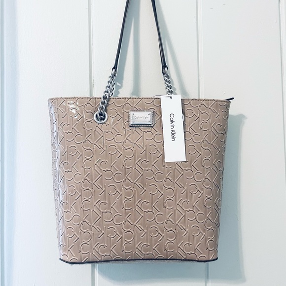 Calvin Klein Handbags - NWT Calvin Klein Initial Tote Purse in Beige/Tan
